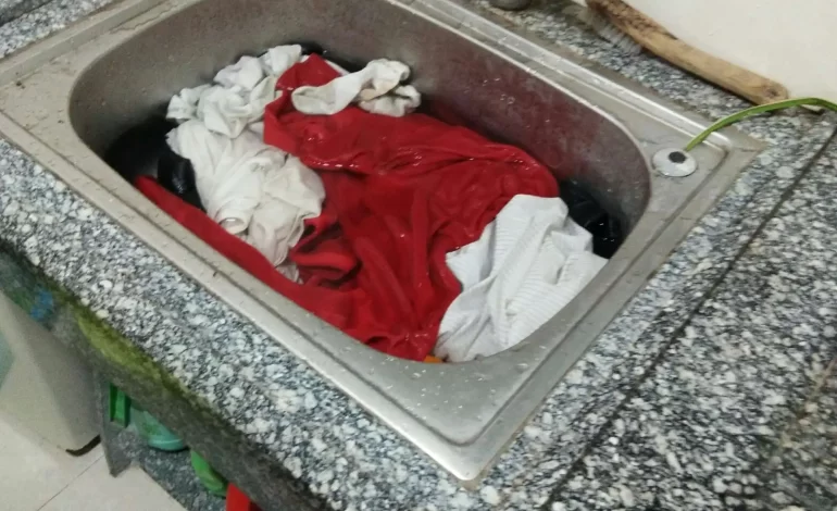 Wash clothes in sink