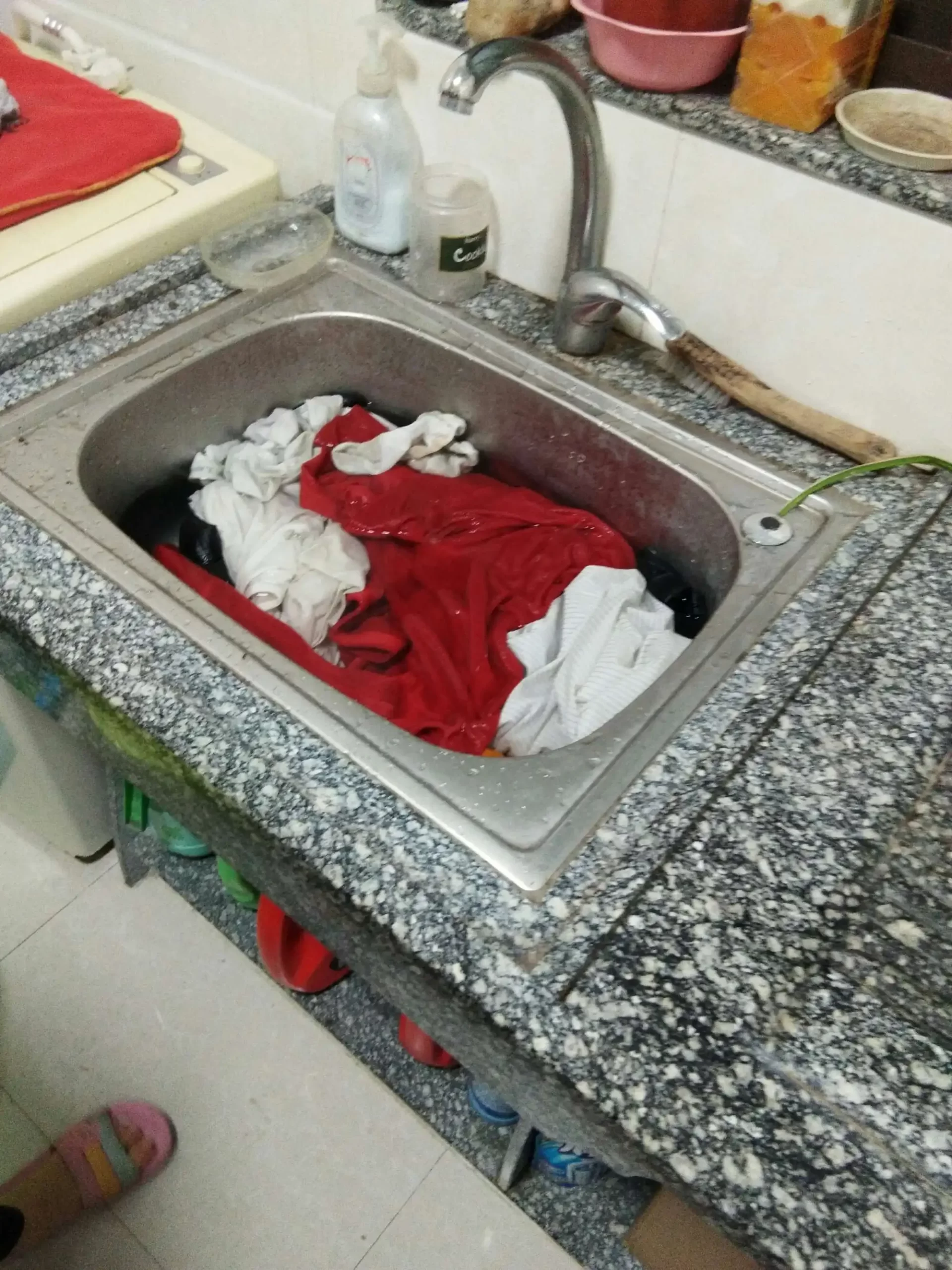 Wash clothes in sink